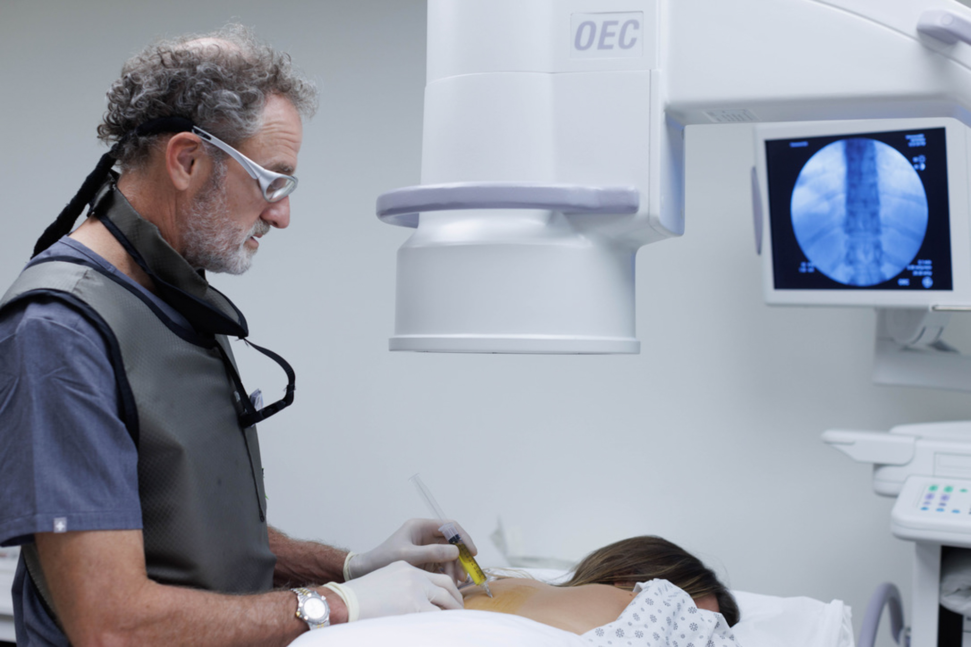Dr. Joye administers a patient's prolotherapy near Daniel Island.