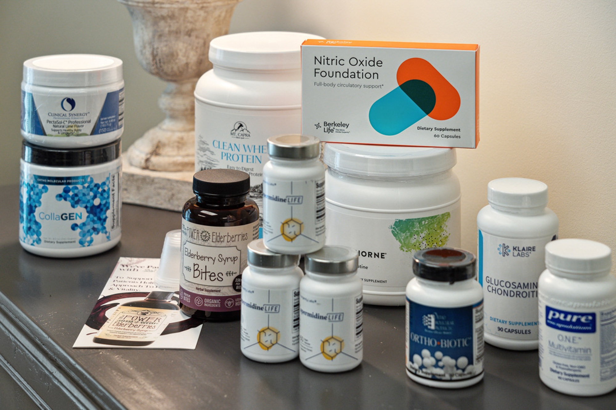 An array of nutritional supplements and protein powder products often used to enhance the effects of strength training for longevity in Charleston.