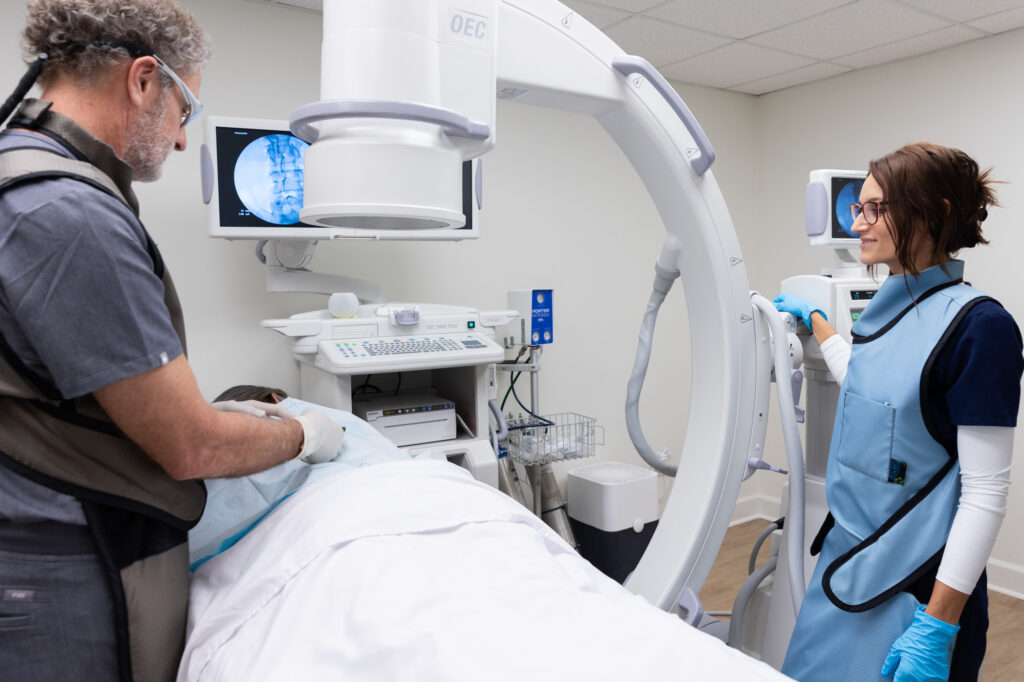 Dr. Joye at InterveneMD conducts a prolotherapy procedure to help a patient achieve back pain relief in Mt. Pleasant.