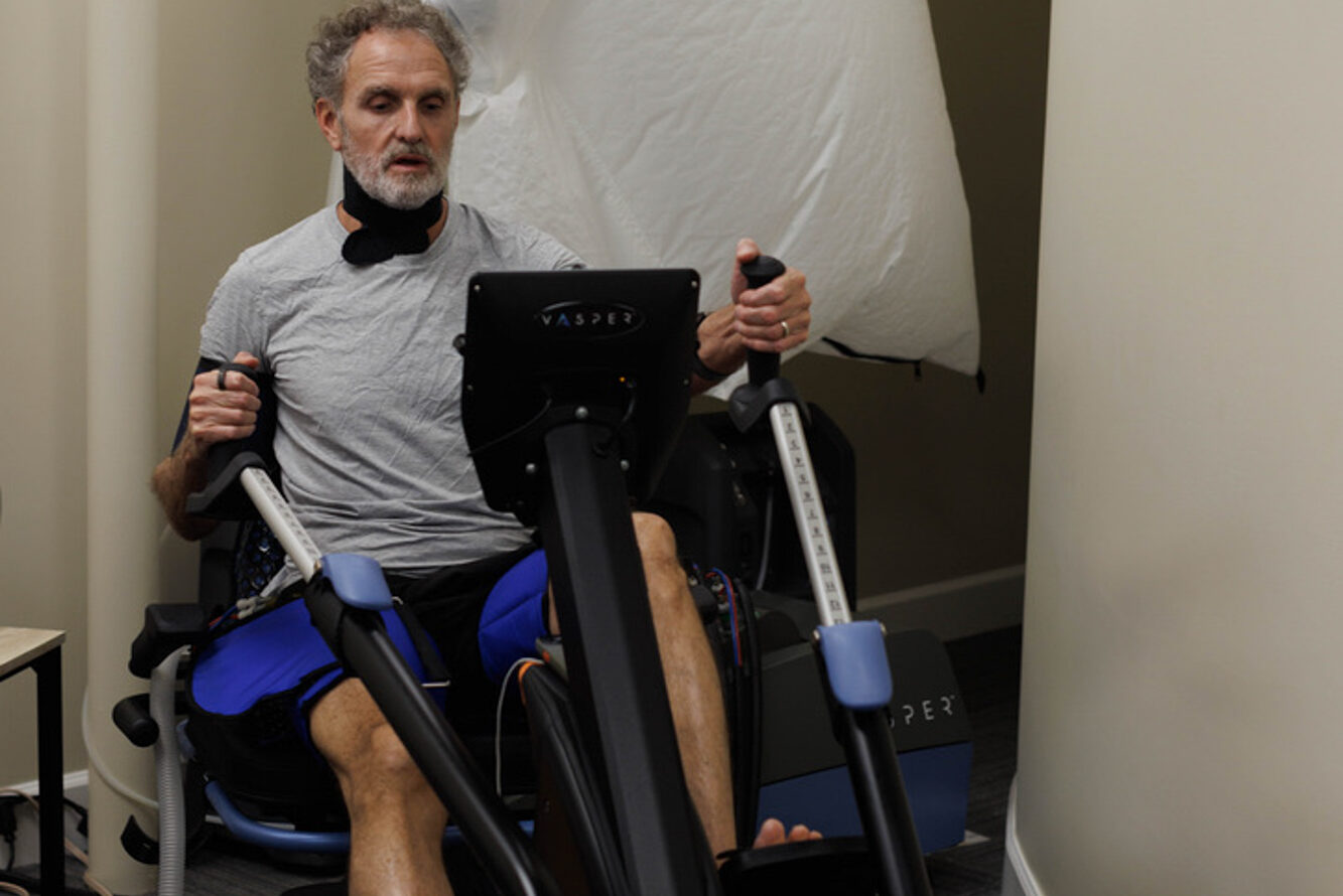Dr. Joye demonstrates exercise with the Vasper system, a training regimen commonly used to optimize VO2 max in Charleston.